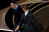 Will Smith slapping Chris Rock across the face at the Academy awards 2022