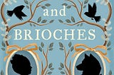 Cover of the book Wolves and Brioches by Alysa Salzberg, featuring two medallion silhouette portraits, one of a woman with an 18th century hairstyle and one with a wolf wearing an 18th century jacket and lace collar. Between them in color is a brioche. The entire cover is decorated with tree branches and leaves. There are the silhouettes of three sparrows, as well.