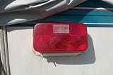 The Cost of Older RV Updates: Replacing the RV Tail Light and License Plate Holder
