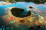 Caribbean private island for sale — Tourism development opportunity in Dixon Cove, Roatan