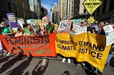 Activists with “Feminists Demand Climate Justice” at the March to End Fossil Fuels