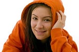 Girl wearing an orange hoodie