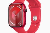Apple Watch Series 9 in red watchface: the Palette face. It does not have hour and minute marks