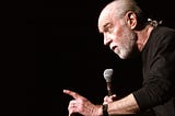 Carlin doing what he does best — dropping truth bombs.