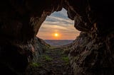 Image by jeremyabaxter — Adobe Stock — Sunset on the last hiding place of king Caractacus, a cave on the hill fort of Caer Caradoc in Shropshire, England