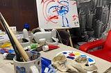 Painting in VR (Virtual Reality) and in the real world at same time performance.