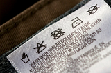 WHAT DOES ALL THOSE LABELS FULL OF SYMBOLS ATTACHED TO OUR CLOTHES MEAN?