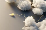 Paper airplane making its way through clouds