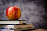 An Apple Above Books