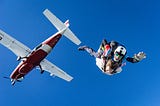 man in free fall after jumping out of an airplane