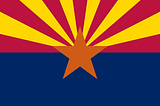 State flag of Arizona. A blue field in the bottom half and a copper star in the middle with red and yellow rays coming from the star at the top.