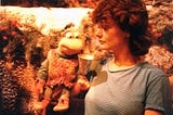 Puppeteer Lee Armstrong and Baby Fraggle on the set of Fraggle Rock