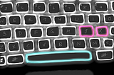 A drawing of a laptop keyboard with the spacebar and the writer’s initials highlighted