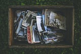 A box of old photos. Photo by Kaboompics .com from Pexels.