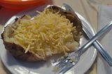 A huge baked potato with vegan ‘cheese’ that shows no sign of melting.