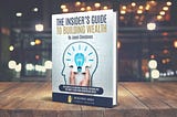 Cover image of “The Insider’s Guide To Building Wealth”, which has a hand placing the final puzzle piece to complete a head with a lightbulb inside.