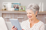 Elderly lady happy about her working iPad