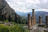 ‘How does religious practice in the worship of Apollo and Dionysus at Delphi in the 4th century…