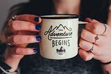 A woman holding a mug.