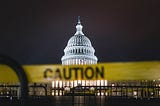 The Guy Who Put His Feet on Pelosi’s Desk Paid for the Envelope He Took