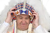 THE POPE GETS A HEADDRESS