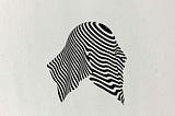 Abstract image of a striped shape veiling an orb on neutral background