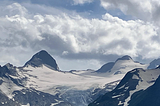 Icy, snow-covered mountains.