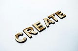 Wooden letters forming the word ‘create’.