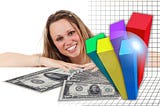 Cash spread out with bar graph and smiling woman