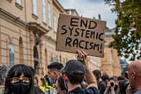 The Burden of Proof of Systemic Racism