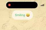 Smiling text on screen after a user has smiled.