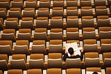 Overhead view of man studying from a notebook