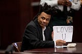 Ronnie O’Neal III doodling ‘Love U’ on paper to garner sympathy from the jury