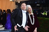 Elon Musk and his mother posing