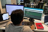 An employee doing Code review at MRS Technologies