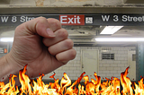 A punching fist punches the air in West 4th Street Station as fire burns.