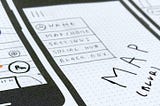 Divider image showing paper wireframes