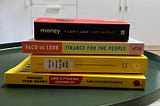 A pile of books around the topic of money