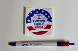 An “I voted early 2024” sticker with a pen