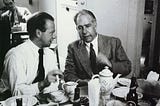 An image of Heisenberg and Bohr sitting and having tea