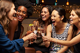 Group of women drinking in a bar
