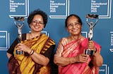 Color photo of Deepa Bhasthi and Banu Mushtaq at the IBP ceremony