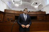 Henri Van Breda in a suit