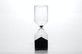 An hourglass running low on time.