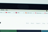 A close up image depicting 10 tabs open on an internet browser