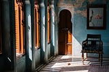 It’s a image of an old haveli with sunlight filterning in through the windows