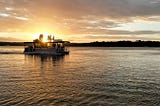 A captivating sunset and a delicious dinner aboard the Noosa Sunset Dinner Cruise!