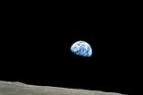 An image of the “pale blue dot” of Earth, as seen from the lunar surface.