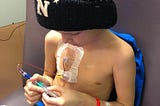Sully, a little boy, receiving cancer treatment.