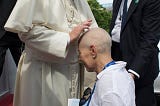 Martha Serra Mohr being blessed by Pope Francis on a Catholic pilgrimage after receiving a phone call from Joe Biden